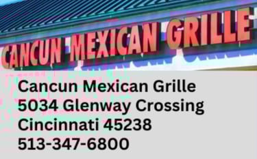 Cancun Mexican Grille restaurant sign with address and phone number in Cincinnati.