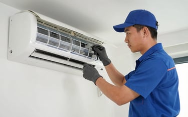 A professional HVAC technician in a clean uniform expertly repairing a split AC unit in a modern living room. The scene is bright and highlights precision and reliability. The color palette incorporates subtle steel blue (#4A6D8C) and off-white (#F5F7FA) tones, projecting a trustworthy and high-quality service mood.