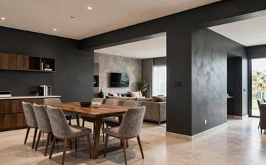 A wide shot of a modern open-concept Brazilian home, showing the dining and living areas integrated with charcoal and sand accents. The walls are perfectly finished, reflecting a high-quality paint job. Bright, professional photography.