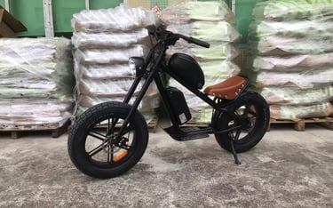 a motorcycle parked in front of a pile of bags