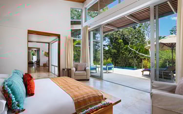 Bedroom over looking the pool in a villa in Belize