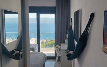 Villa Fay bedroom with a view of the ocean