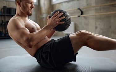 a man using a medicine ball for exercise