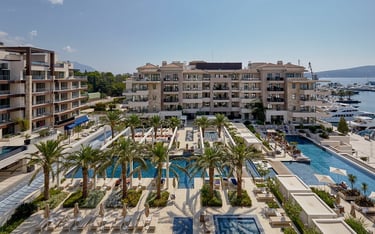 Aqua and Elena building and swimming pools in Porto Montenegro marina