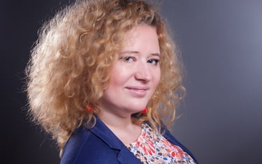 Anna Sowińska, Doradca zawodowy, coach kryzysowy, kręcone włosy