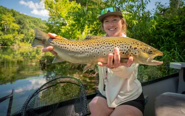 Check out Brianne with a big brown landed on a midge.