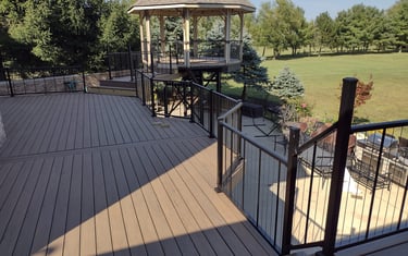 Outdoor composite deck by professional deck builder in [Columbus, Ohio]