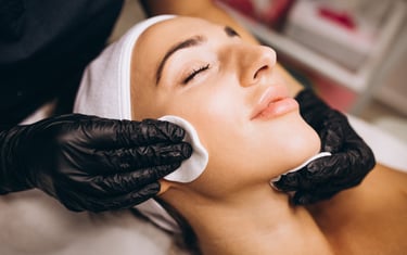 a woman getting a facial lift in a beauty salon