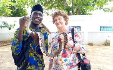Tourist Visiting Pythons Temple in Benin