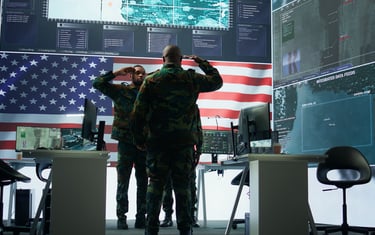 two us soldiers saluting to each other in the headquarters