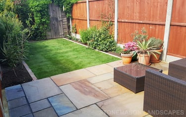Small Sandstone Patio With New Lawn & Border Edging