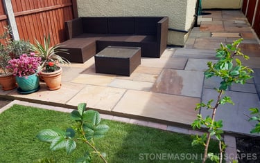 Small Sandstone Patio With New Lawn & Border Edging