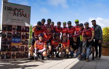 a group of people standing around a bike