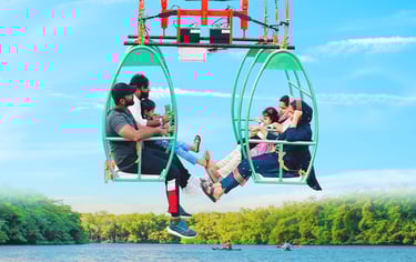 a man and woman sitting on a chair in a chair