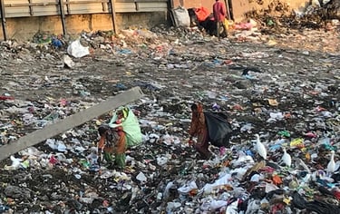 Waste pickers. on a huge rubbish dump in India