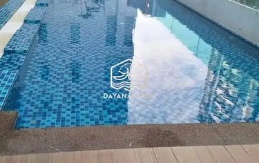kolam renang minimalis dengan batu hijau tasik