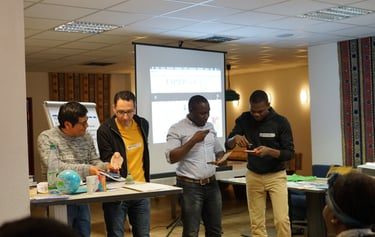 Diverse team of professionals collaborating at a business workshop presentation and seminar.