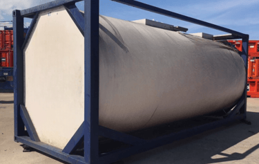 a large tank with a large tank sitting on a trailer
