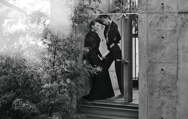 Elizabeth Lotz (Liz Lotz) art director fashion editorial in architectural landscape with two models in black and white elegan