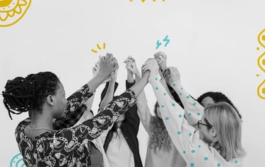 a group of people holding hands in a circle