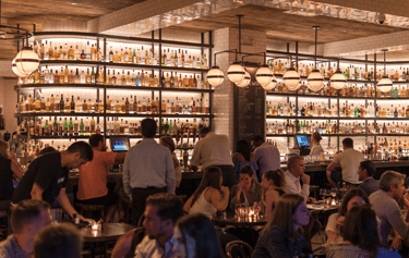 People drinking at a bar