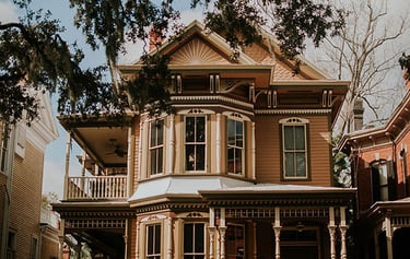 alt="Newly painted victorian house"