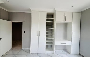 a room with a desk and a desk with a desk and a chair, House Construction Frans-del Investment CC Co