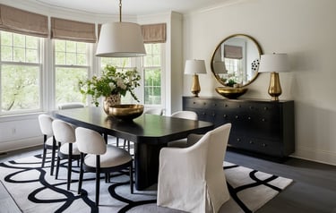 a dining room table with a black table and chairs
