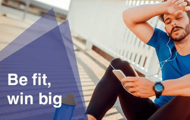 man sitting down mid jog, text 'be fit, win big'
