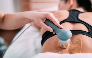 UST, TENS machine applied on lower back for pain management.