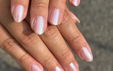 a woman's hand with a manicured manicured manicured manicured mani