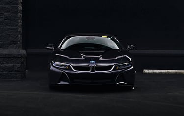 Sleek, black, and elegant BMW Coupe car photos taken at 704 Exotics in Charlotte, North Carolina.