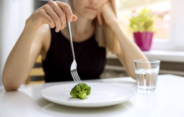 Pushing broccoli around on plate