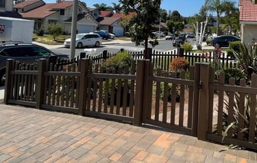 Brown vinyl picket fence