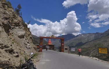 Tracey Billington riding the Leh to Manali highway over the great Himalayan range, Ladakh, India 