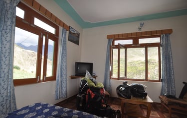 Tracey Billington riding the Leh to Manali highway over the great Himalayan range, Ladakh, India 