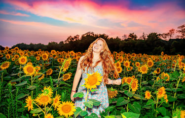 Senior Picture in a sunflower field by a professional senior picture photographer in Hershey PA
