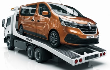 un renault trafic sur une dépanneuse blanche pour un transport automobile