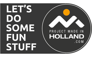 a black and white sign that says, let's do some fun by the brand Project Made in Holland
