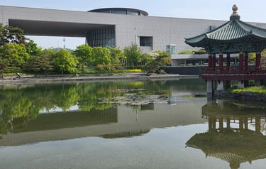 View of the museum, pond and pagoda