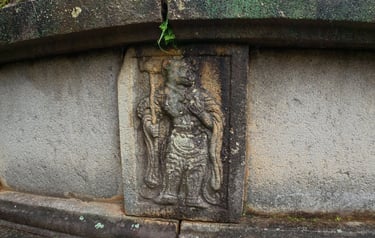 Carving of one of the 12 gods of the Zodiac on the base of the tomb