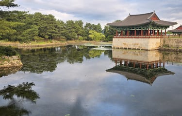 View of reconstructed building and pond