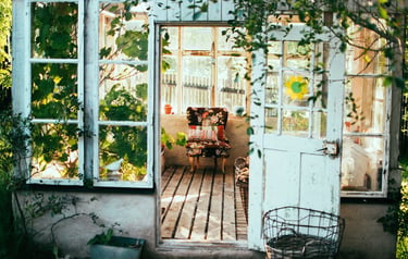 a door way with a chair and a table