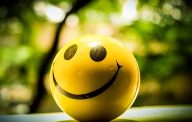 a yellow ball with a smiley face