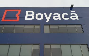 rotulación en vinilo azul y rótulo fachada Boyaca