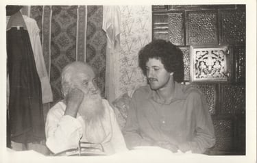 Vintage black and white photo of Vergiliu Neculau talking to Eugen Mirtz