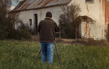 Martin Osner capturing an old abandoned building on location during the creation of his fine art Abandoned Places Photography