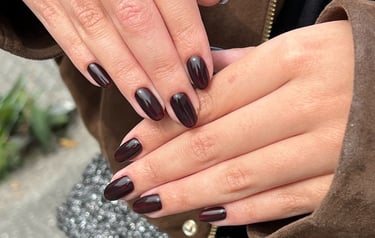 a woman's hands with a manicured manicured manicured manicured mani