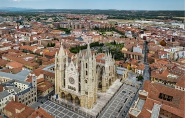 Aerial view of the Gothic Leon Cathedral and historic cityscape in Leon, Spain.