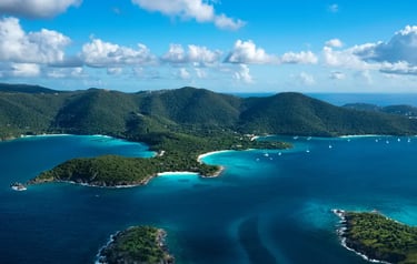 Aerial view of Maho Bay and Trunk Bay's turquoise waters and tropical islands in St. John, US Virgin Islands.